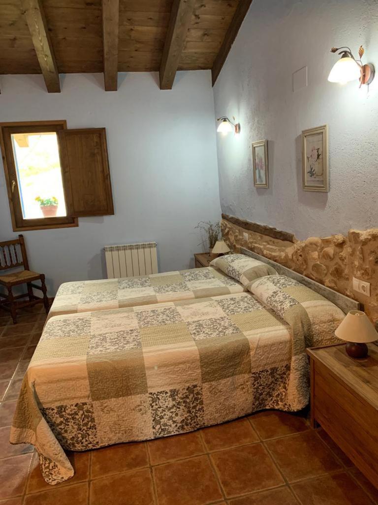 Masia de la Serra de la Cogulla Peñarroya de Tastavins Habitación foto